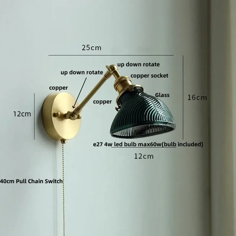 Antique brass ceramic copper led wall light with a vintage brass finish and dark green ribbed glass shade bedroom sconce