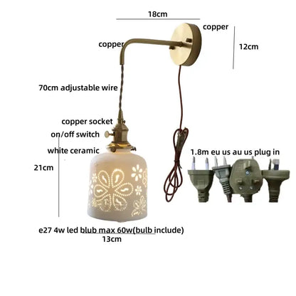 Antique brass ceramic led wall light with white floral cutout ceramic shade and adjustable copper arm for bedroom decorbites ceramic led wall