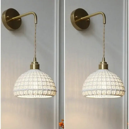 Antique brass ceramic led wall light with white patterned glass pendant and brass-finished metal arm for bedroom decorbites ceramic led wall