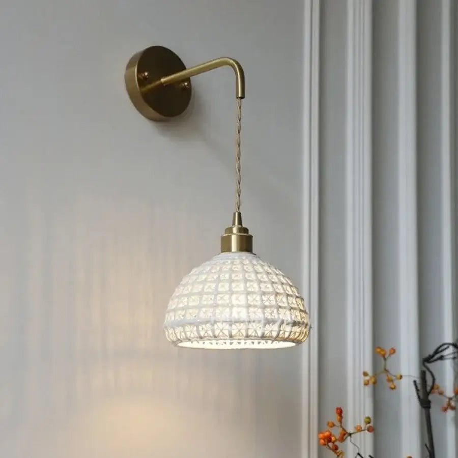 Antique brass ceramic led wall lights featuring a white patterned glass pendant with brass arm and chain decorbites ceramic led wall