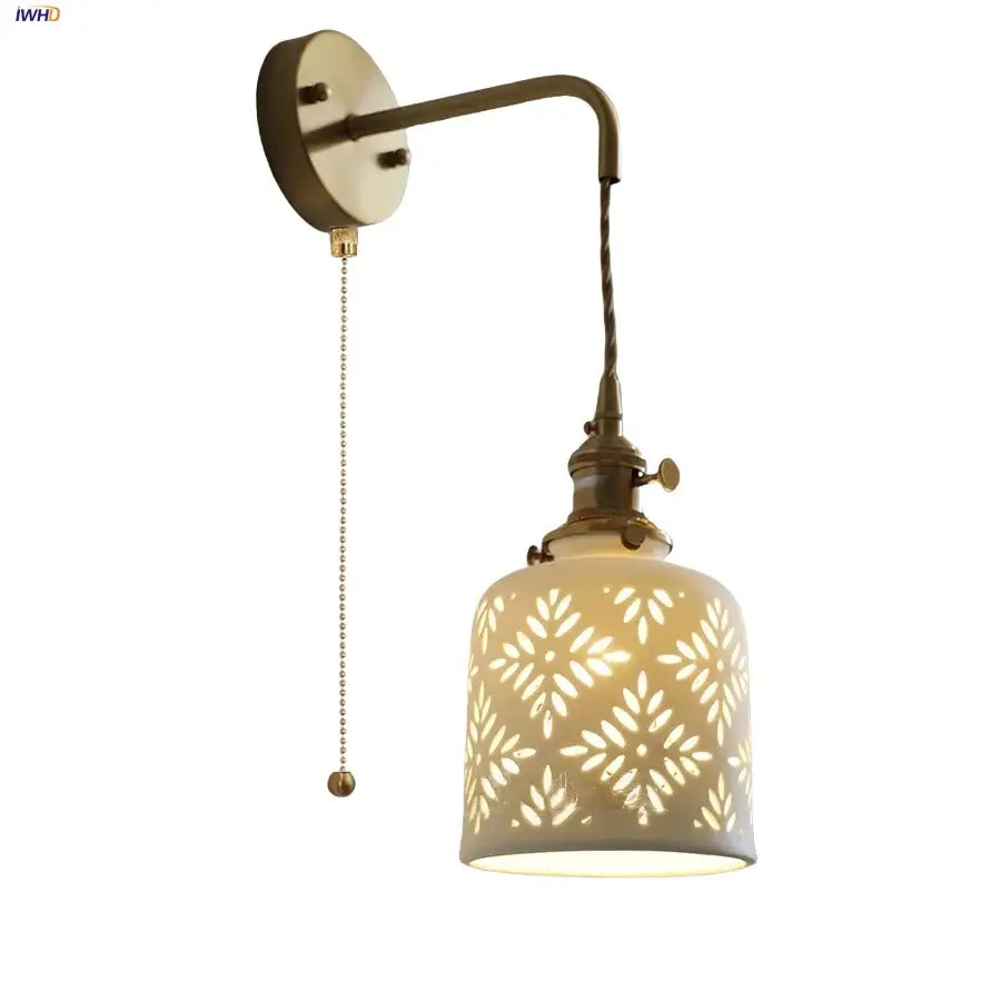 Antique brass ceramic led wall sconce with frosted floral cutout shade for bedroom decorbites ceramic led wall lighting
