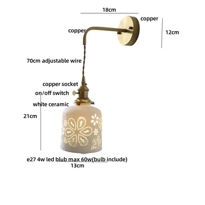 Antique brass ceramic led wall sconce with vintage copper finish and white floral cutout ceramic led shade for bedroom decor