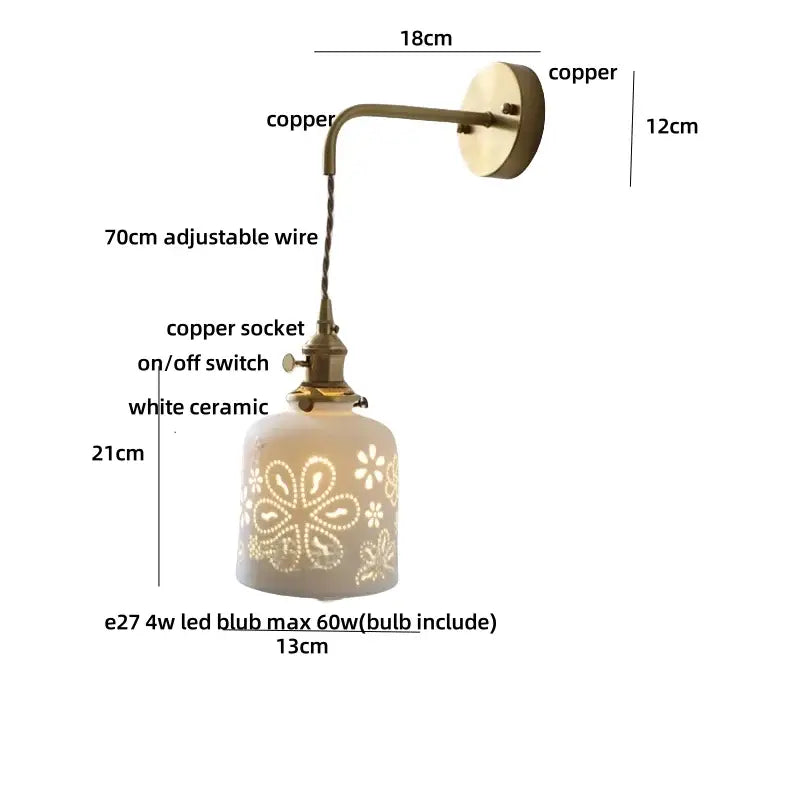 Antique brass ceramic led wall sconce with vintage copper finish and white floral cutout ceramic led shade for bedroom decor