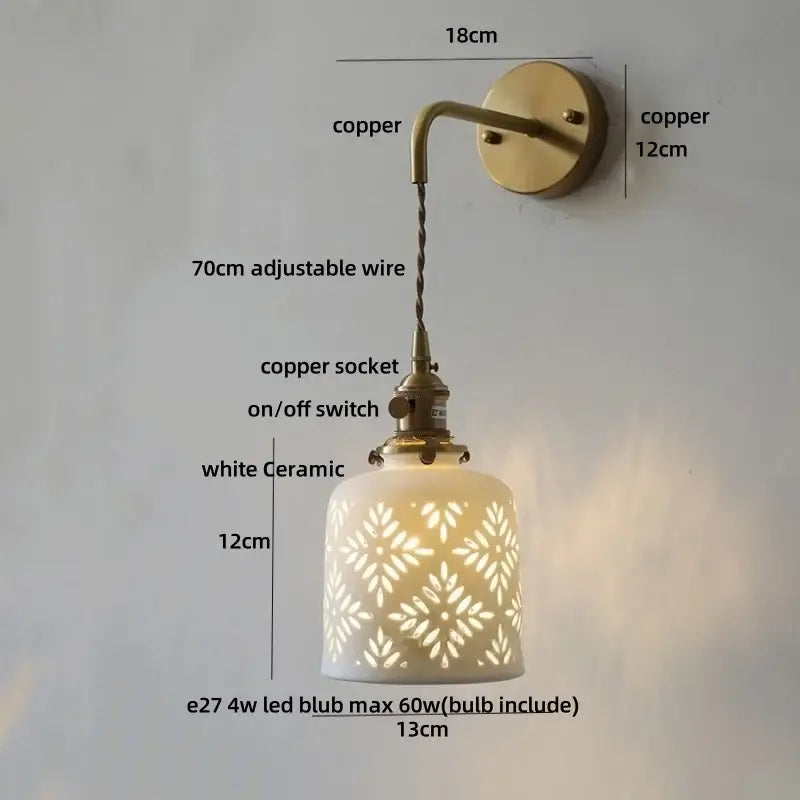 Antique brass ceramic led wall sconce with white floral cutout ceramic led wall and copper hardware for bedroom decorbites