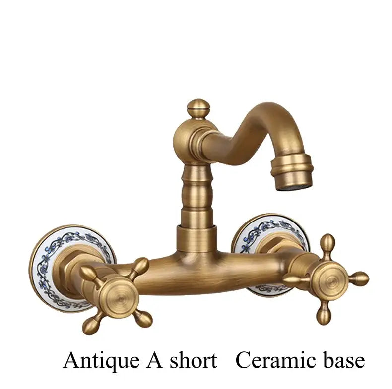 Antique brass ceramic wall mount faucet with ornate cross handles and blue and white porcelain bases for kitchen decorbites brass ceramic