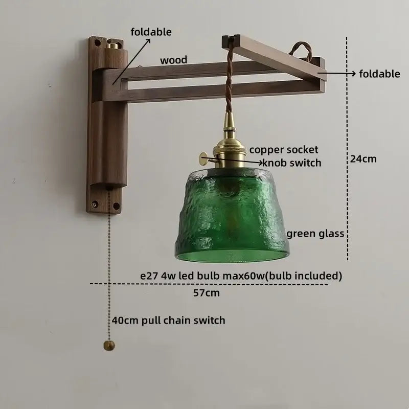 Antique brass ceramic walnut wall sconce with foldable wooden arm and scalloped green glass shade for bedroom decor