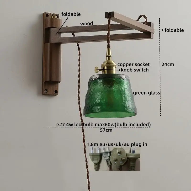 Antique brass ceramic walnut wall sconce with foldable wooden arm and green scalloped glass shade for bedroom decor