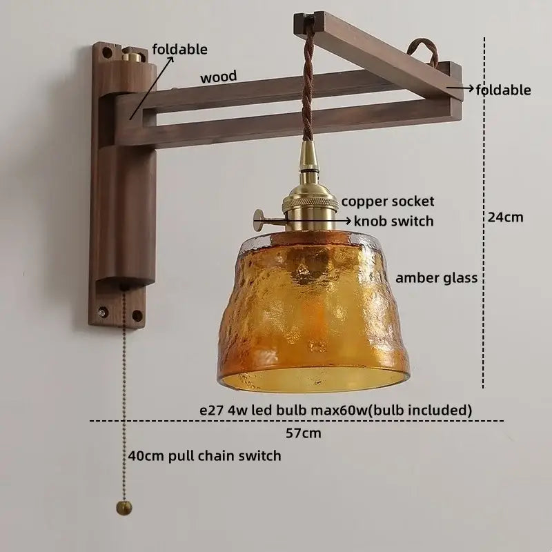 Antique brass ceramic walnut wall sconce with a rustic foldable wooden arm amber textured scalloped glass shade and pull chain switch