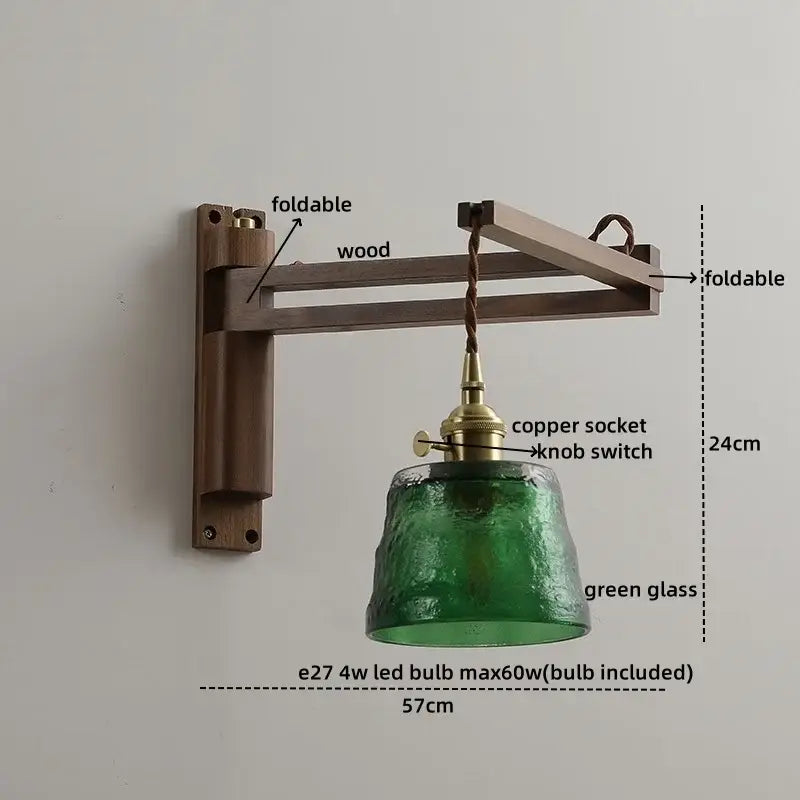 Antique brass ceramic walnut wall sconce with dark wood foldable arm and green textured glass scalloped shade decorbites ceramic walnut wall