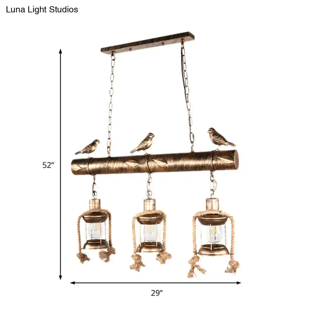 Decorbites antique brass lantern pendant with clear glass three-light chandelier featuring bulb bases and bird accents