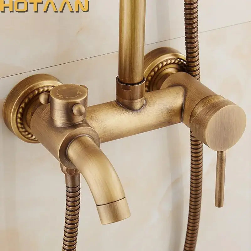 Antique brass concealed wall mounted shower faucet with ornate beaded detailing and matching handheld spray by decorbites