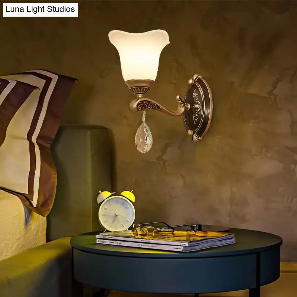 Antique brass wall lamp with frosted glass shade and crystal drop featuring e12 e14 base for bedroom sconce use