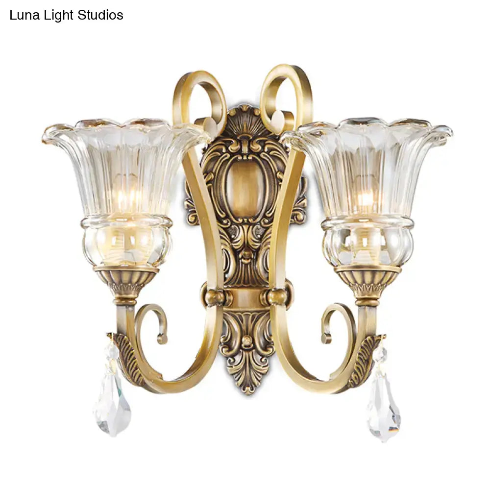 Antique brass crystal drop wall sconce with two LED fluted glass shades for 220v-240v and 110v-120v use in bedrooms
