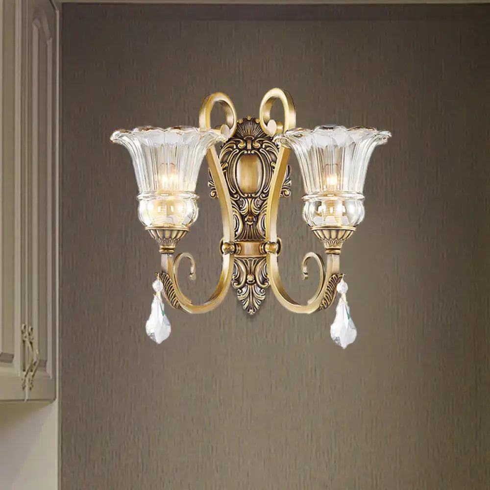 Antique brass crystal drop wall sconce with two clear fluted glass shades compatible with 220v-240v led incandescent fluorescent bulbs