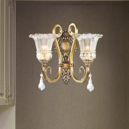 Antique brass crystal drop wall sconce with two clear fluted glass shades compatible with 220v-240v led incandescent fluorescent bulbs