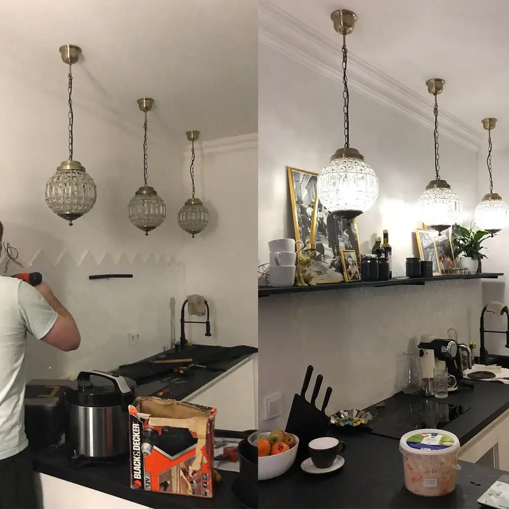 Four vintage-style pendant lights with clear faceted glass globes and brass chains for crystal empire ball chandelier decorbites