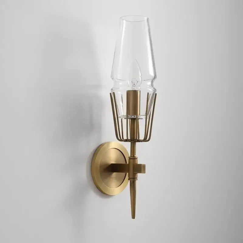 Brass-finished wall light with clear crystal glass shade and wire cage design for bedroom and bath decorbites dimmable crystal
