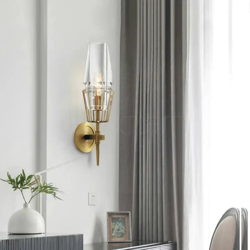 Antique brass crystal glass wall light with gold-toned geometric cage and clear glass shade for bedroom decorbites dimmable wall light