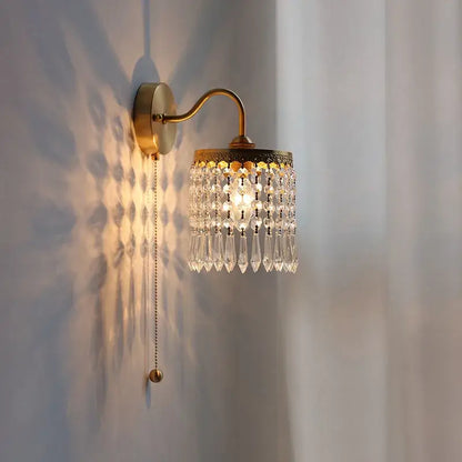 Antique brass crystal led wall sconce with cascading clear crystal teardrop pendants for elegant decorbites crystal led lighting