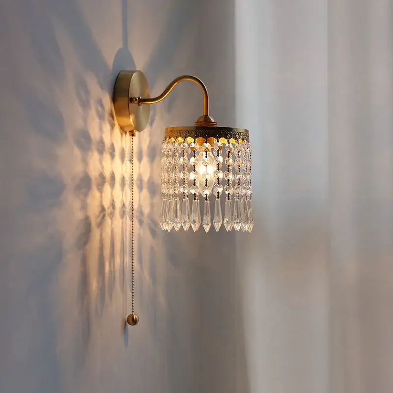Antique brass crystal led wall sconce with clear crystal teardrop pendants for elegant bedroom decorbites crystal led lighting