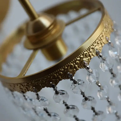 Antique brass wall sconce with gold-toned ornate scrollwork and clear crystal beads for decorbites crystal led wall use
