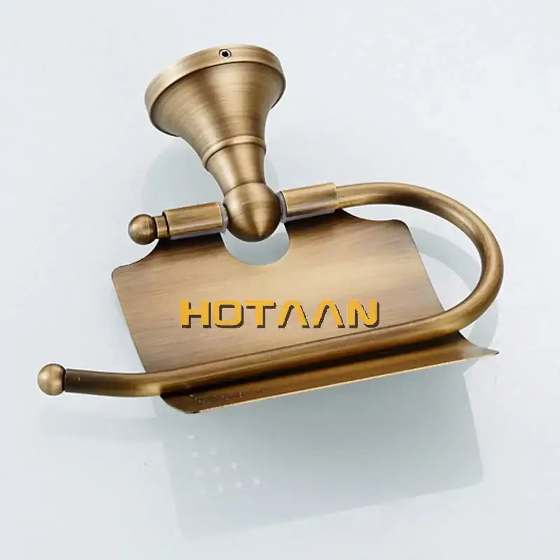 Antique brass curved toilet paper holder with sleek design and hotaaan engraving for bathroom accessory use