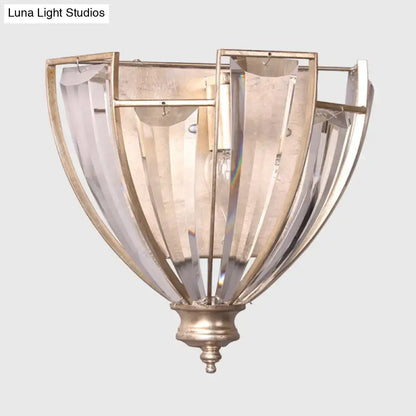 Antique brass curved wall sconce with ribbed glass panels and brushed gold metal frame for bedroom lighting