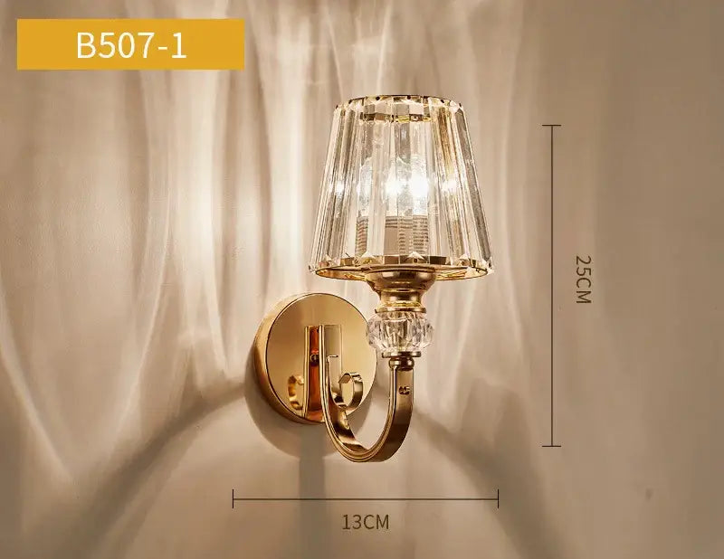 Gold-finished wall lamp with faceted crystal led shade and decorative crystal accent for living room decorbites crystal led use