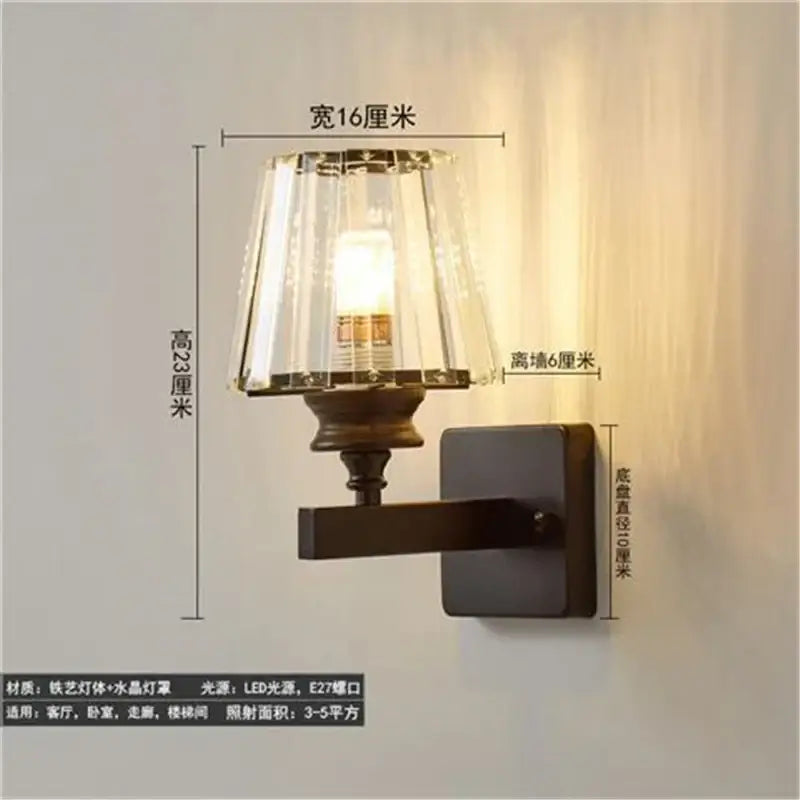 Bronze-finished wall lamp with faceted crystal led shade in antique brass and dark bronze for living room decorbites crystal led wall