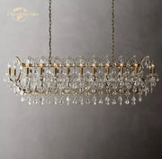 Antique brass decorbites crystal iron chandelier with cascading clear crystal droplets for dining room decor