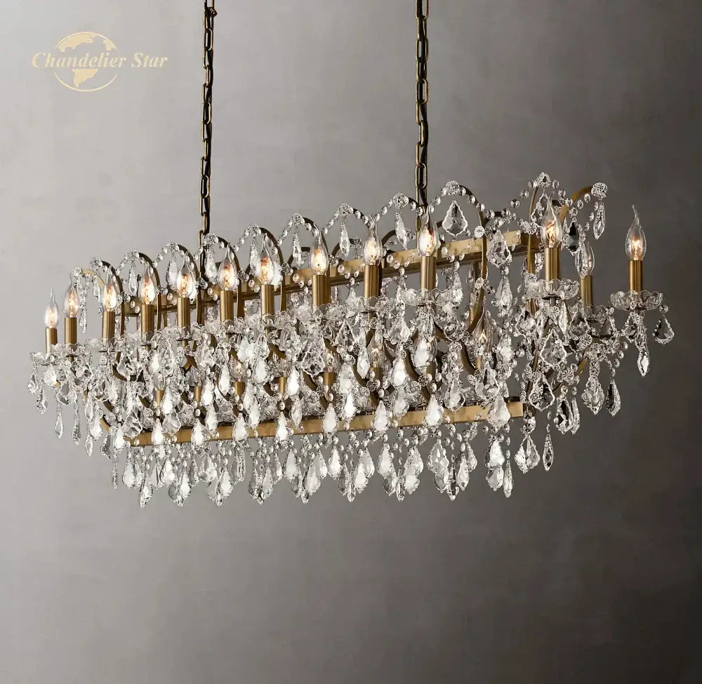 Antique brass decorbites crystal iron chandelier with cascading clear crystal droplets and candle-style bulbs for dining room
