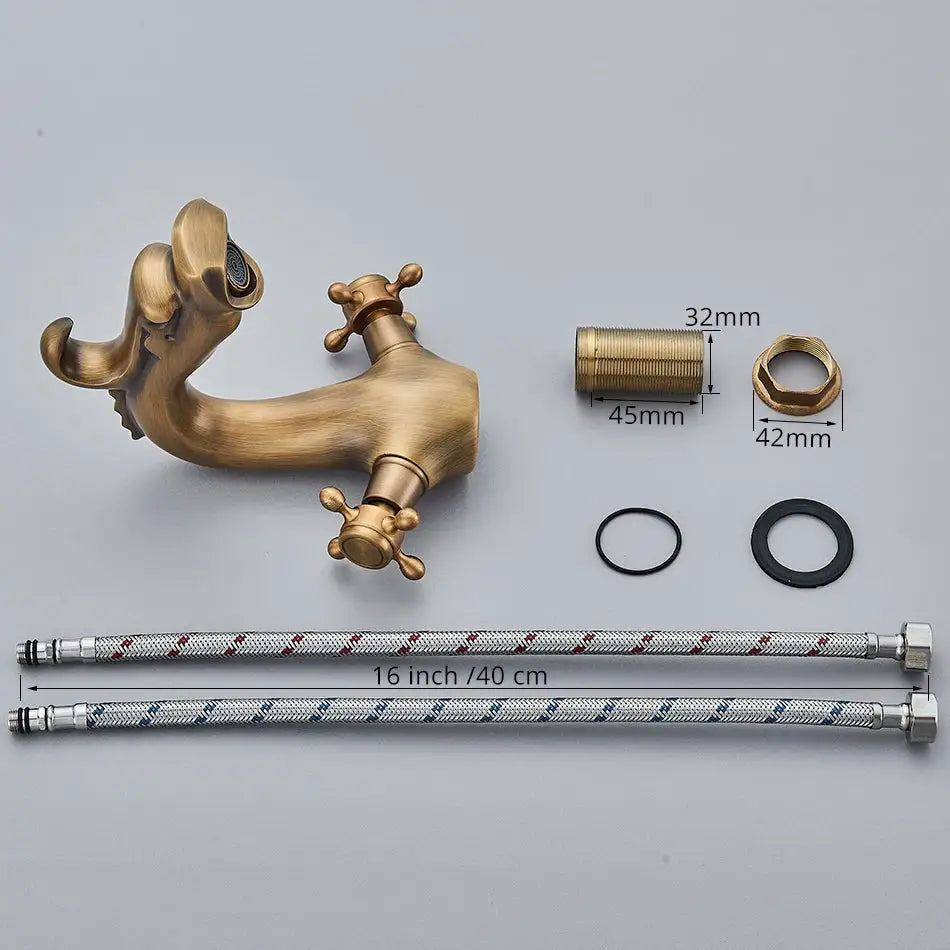 Antique brass decorbites dragon style kitchen faucet with ornate curved spout and cross-handle design in brass finish
