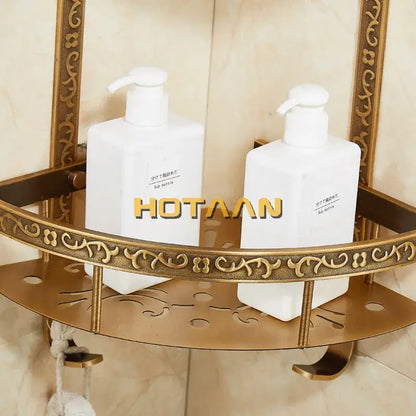Two white soap dispensers on a decorbites antique aluminum brass double layer corner shelf for bathroom storage