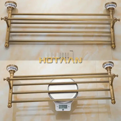 Antique brass double tier towel rack with ornate ceramic end caps and multiple horizontal bars towel holder