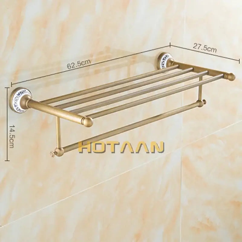 Antique brass double tier towel rack with decorative ceramic wall mounts for bathroom towel holder use