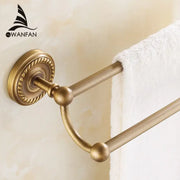 Antique brass double towel bar with ornate circular base and spherical finials for bathroom use