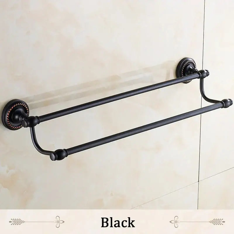 Black double towel bar with ornate vintage-style mounting plates and polished metal finish for bathroom use