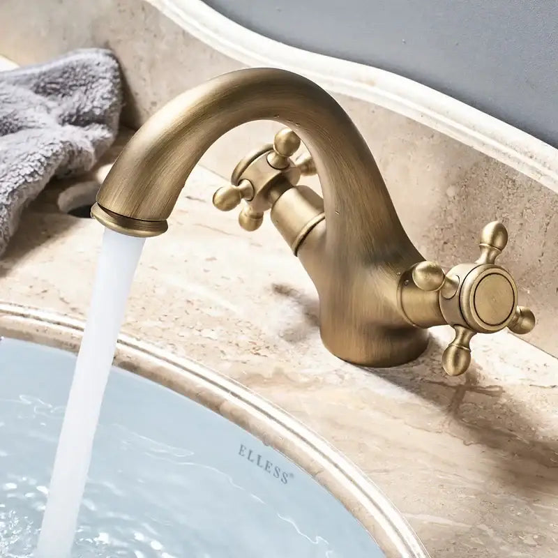 Antique brass dual handle basin faucet with cross-shaped knobs for bathroom vanity sink by decorbites