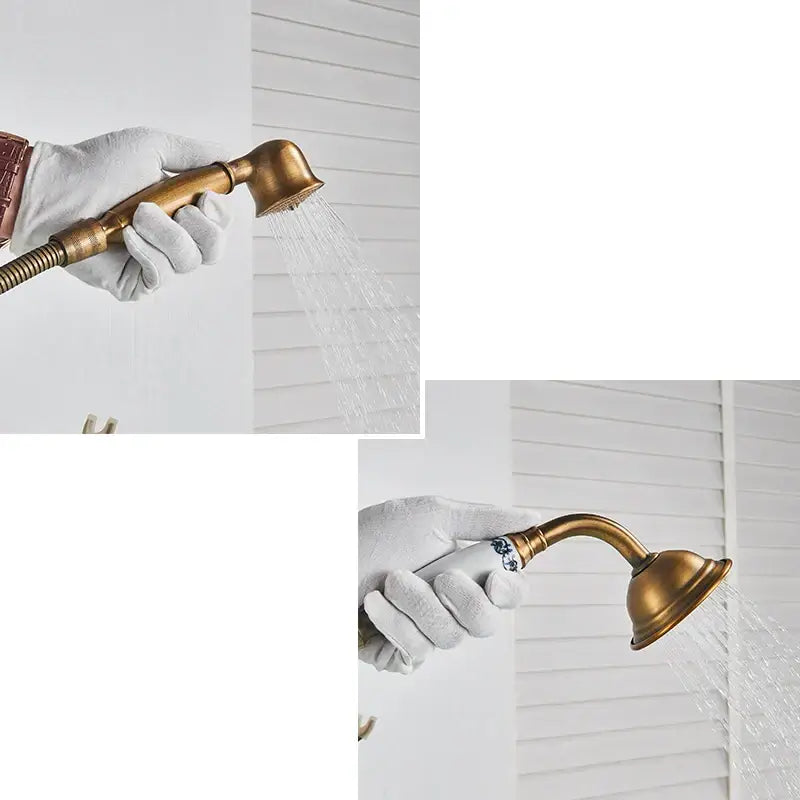 Antique brass dual handle floor mount bath set with handheld showerhead featuring blue floral decorbites brass floor detailing