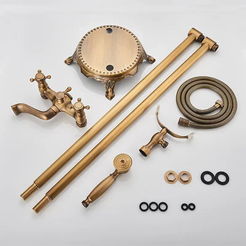 Antique brass dual handle floor mount bath set with ornate detailing and matching shower hose by decorbites brass floor