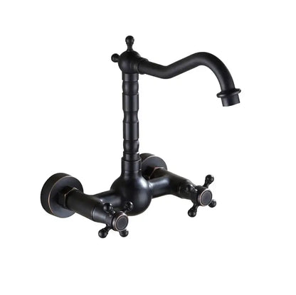 Black matte dual handle wall-mounted kitchen faucet with curved spout designed for hot water and antique brass finish
