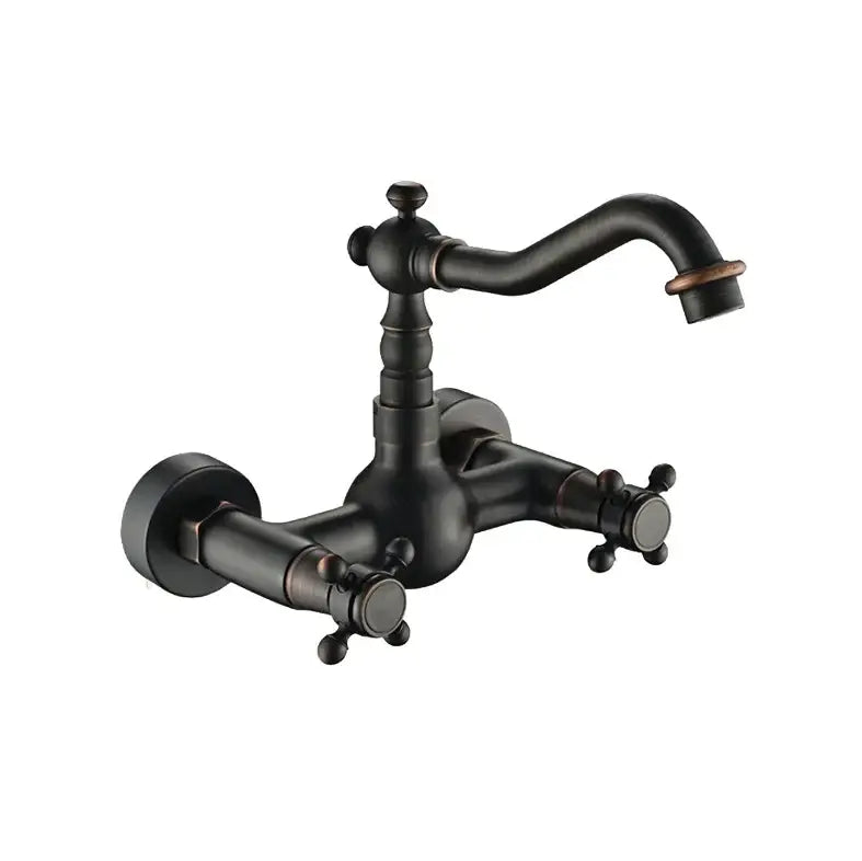 Antique brass dual handle kitchen faucet with black matte finish cross handles and curved spout for hot water use