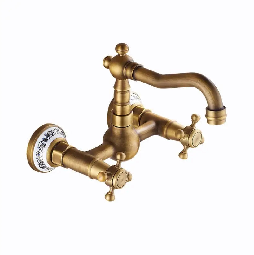 Antique brass dual handle kitchen faucet with ornate cross handles porcelain knobs for hot water use