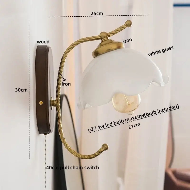 Antique brass floral led wall lights with frosted glass lampshade and wooden backplate for bedroom wall sconce