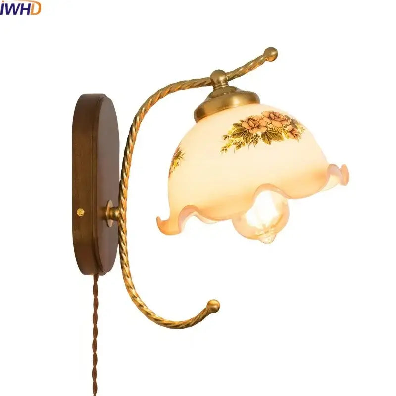 Antique brass floral frosted glass led wall light featuring delicate patterns for bedroom wall sconce lighting