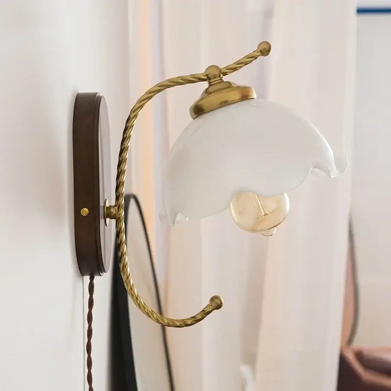 Antique brass led wall lights with frosted glass tulip shade and twisted metal arm for bedroom sconce lighting
