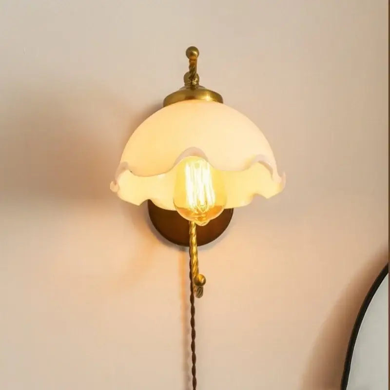 Antique brass floral frosted glass led wall lights with ruffled shade and brass accents for bedroom sconce lighting
