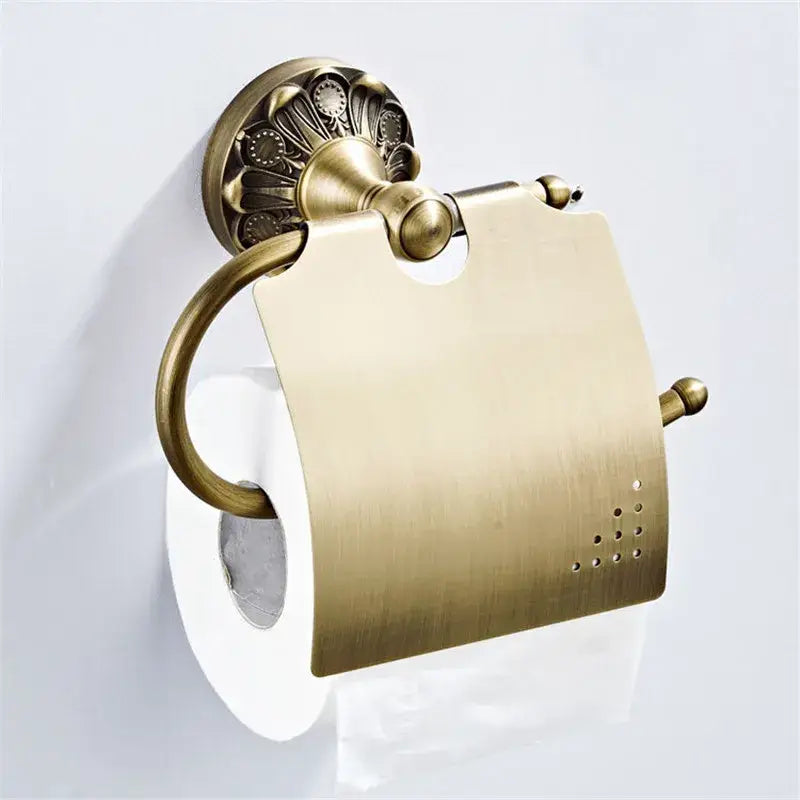 Antique brass floral hardware set featuring a double tier towel rack and ornate bathroom hardware set in brass finish