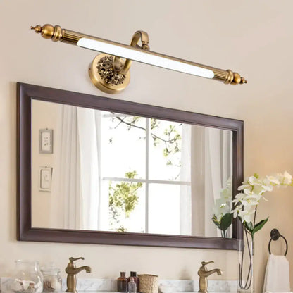 Antique brass floral vanity wall lamp with ornate detailing and warm white light in brass finish for bathroom use
