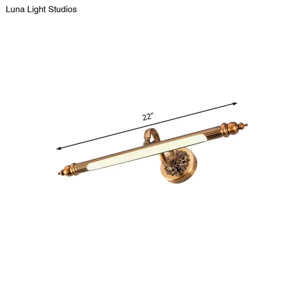 Antique brass floral vanity wall lamp with brass finish warm white light and ornate detailing for bathroom use